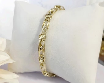 Exclusive Hypoallergenic unique 14k Gold Filled bracelet 6mm wide.