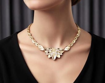 Colar exclusivo hipoalergênico Statement em ouro bicolor 14k.