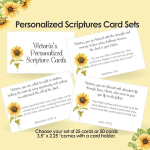 May include: A set of personalized scripture cards featuring sunflower illustrations. The cards are 3.5 inches by 2.25 inches and come with a card holder. The text on the cards includes verses from the Bible, such as Ephesians 5:15-16, Hebrews 13:6, and John 10:10.