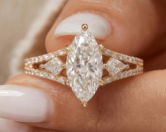 Anello di fidanzamento vintage con moissanite a marquise, fede nuziale in oro 14 carati con gambo diviso e pietra laterale a forma di aquilone.