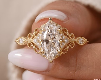 Anello di fidanzamento PREVEL con moissanite taglio marquise vittoriano e alone in filigrana d'oro antica Royal Vintage.