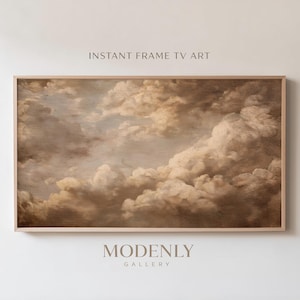 May include: A framed artwork depicting a vintage-style painting of a cloudy sky. The artwork has a light brown wooden frame. The painting shows fluffy, white and brown clouds against a muted blue background. The text "INSTANT FRAME TV ART" and "MODENLY GALLERY" are visible.