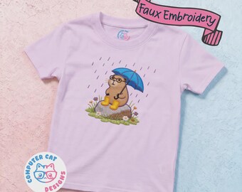 Happy Capybara In the Rain T-Shirt | Cottagecore | Whimsical Faux Embroidery | Cozy Forest Animals | Kawaii Nature Lover Gift