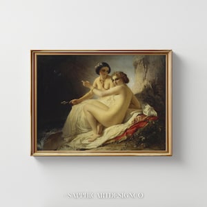 May include: A framed classical painting featuring two nude figures in a natural setting. The artwork, set in a gold frame, depicts the figures with light skin tones, draped in white fabric, and set against a dark background with a hint of a waterfall.