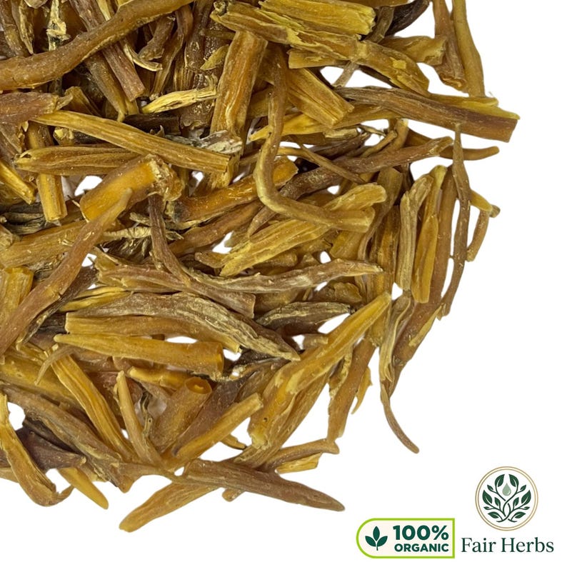 Whole dried yellow Shatavari roots showing natural beige color and fibrous texture