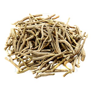 Whole dried Ashwagandha roots on rustic table, raw Withania somnifera herb for herbal use