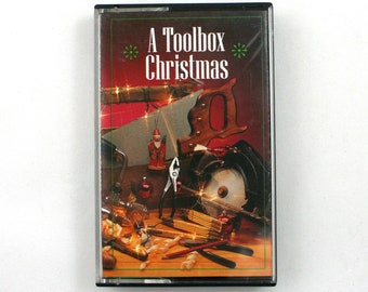 Vintage 1990s A Toolbox Christmas cassette tape, novelty holiday music, gift for woodworker, power tool sounds, xmas carol stocking stuffer