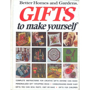 May include: A book cover with the title "Gifts to make yourself" from Better Homes and Gardens. The cover features a collage of images of handmade gifts, including a wooden doll, a pillow with a bird design, and a wooden box with a floral design.