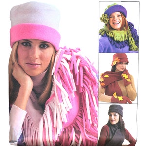 May include: Three different styles of fleece hats and scarves. The first hat is white with a pink band, the second hat is purple with a green scarf, and the third hat is brown with a red scarf.