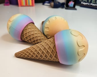 Fidget clicker con forma de cono de helado arcoíris