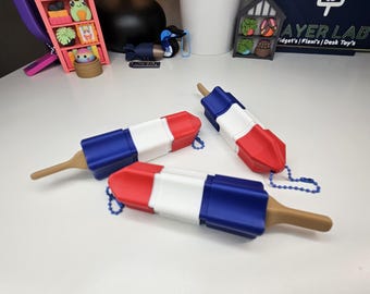 Llavero antiestrés Rocket Pop impreso en 3D / Colgante para bolsa de helado rojo, blanco y azul