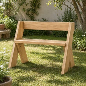 May include: A light brown wooden bench with an angled back and legs. The bench is made of natural wood and is set on a grassy lawn. The design is simple and modern, suitable for outdoor seating in a garden or patio setting.