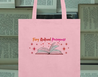 Fiery Redhead Protagonist organic tote bag, open book graphic, bookworms, film fans, storytellers, ginger gift idea