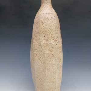 tall woodfired bottle, natural ash glaze. 3 day firing