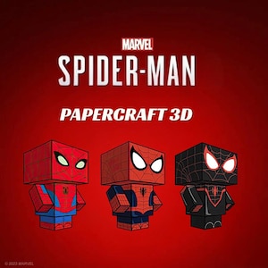 May include: Three 3D papercraft figures of Spider-Man in red, black, and blue, with the Marvel logo and "SPIDER-MAN" text above. The figures are blocky and stylized, with the text "PAPERCRAFT 3D" below.