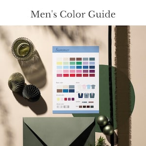 以下が含まれることがあります： 「Men's Color Guide」と「Summer」のカラーパレットが特徴的な静物画。装飾的な球体、グラス、封筒が写っており、全体的に落ち着いた色合いでまとめられています。ミニマルでスタイリッシュな印象です。