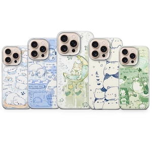 May include: Five phone cases with various designs. One case features a sleeping puppy, another has a blue background with drawings, and a third shows a cat on a crescent moon. The other two cases have cat and star designs.