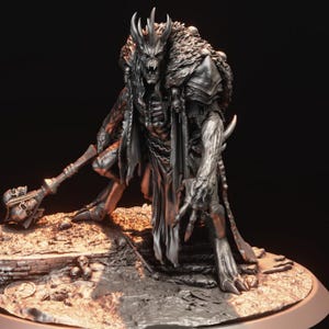 May include: A grey, detailed miniature figurine of a skeletal, horned creature wearing a tattered cloak and fur mantle. The figure holds a mace topped with skulls and stands on a base scattered with small skulls and debris, rendered in a metallic finish.