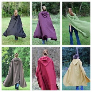 May include: Six different hooded cloaks in various colors, including black, purple, green, brown, red, and yellow. The cloaks are all made of a soft, flowing fabric and have a simple, elegant design.