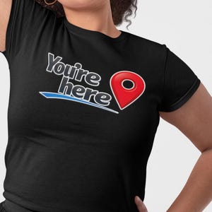 You're Here location pin T-shirt, unisex cotton travel souvenir top, funny map marker graphic tee, casual explore shirt for travelers