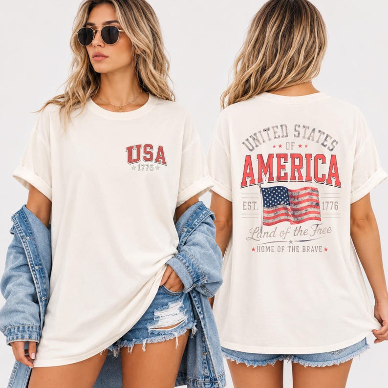 This distressed patriotic women’s t-shirt combines vintage USA graphics with bold American flag artwork to create the perfect Fourth of July outfit. Featuring retro typography inspired by classic Americana designs, this shirt works beautifully for fireworks displays, patriotic concerts, family cookouts, beach vacations, and summer festivals. Comfortable and stylish, this USA patriotic tee easily pairs with denim shorts, sneakers, or layered jackets for a timeless all-American look.