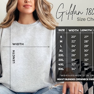 May include: A light gray crewneck sweatshirt with a size chart. The chart displays measurements in inches for width, length, and sleeve length, ranging from size small to 5XL. The text "Gildan 18000" is visible at the top.