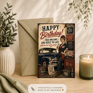Può includere: Un biglietto d'auguri rettangolare con un'illustrazione in stile vintage di una persona in tuta blu che tiene una chiave inglese accanto a un pick-up blu scuro. Il testo recita Happy Birthday, Bold, Brilliant, and Built to Last.