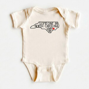 Baby Shower Gifts, Someone In North Carolina Loves Me Onesie®, Cute Baby Shirt, Loved Baby T-shirt, State Baby Bodysuit, Baby Natural Tee image 2