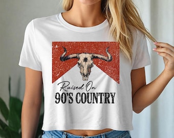 90年代カントリーで育ったブルスカル - クロップド丈のゆったりTシャツ、カントリーコンサートTシャツ、かわいいウエスタンミュージックシャツ、カウガールTシャツ、カントリーミュージックファン
