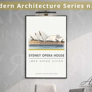 May include: A framed art print featuring the Sydney Opera House. The artwork showcases the iconic building with its white sail-like structures against a light background. The text "SYDNEY OPERA HOUSE" and "JØRN OBERG UTZON" are displayed below the image.