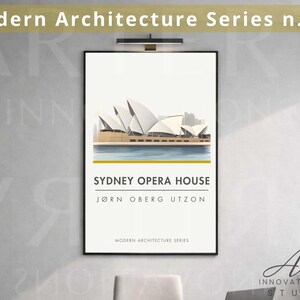 May include: A framed art print featuring the Sydney Opera House. The artwork showcases the iconic building with its white sail-like structures against a light background. Text at the top reads "Modern Architecture Series n. 02". The title "SYDNEY OPERA HOUSE" is displayed prominently.