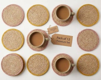 Handgemaakte jute onderzetter set van 4, ronde gevlochten onderzetters, roze gele accentrand, milieuvriendelijk tafeldecor, 10 cm gemaakt in India