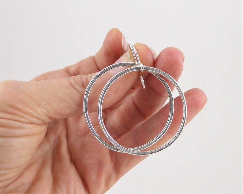 Textured hoop earrings in bright sterling silver your choice of two sizes