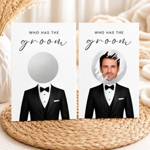 May include: Two white rectangular game cards with the text WHO HAS THE groom in black. Each card features a graphic of a black tuxedo with a bow tie. One card has a solid silver scratch-off circle, and the other shows a man's face revealed.
