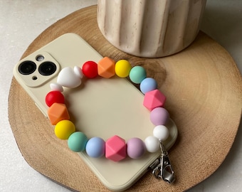 Llavero con colgante para teléfono, pulsera y cordón, hecho a mano, con cuentas de silicona gruesas multicolores estilo arcoíris.