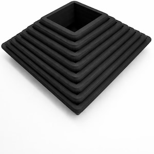 May include: A black, stepped pyramid-shaped object with a square opening at the top. The object has a series of receding square tiers, creating a geometric design. The dark color and clean lines give it a modern aesthetic.