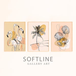 May include: Three framed wall art prints featuring black line drawings on a soft peach background. The first print shows two flamingos, the second a palm tree, and the third a collection of seashells. The text SOFTLINE GALLERY ART is below.
