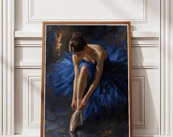 May include: A framed painting of a ballerina in a blue tutu, tying her pointe shoe. The artwork has a dark, moody color palette with a focus on the dancer's form and the texture of the fabric. The frame is a warm brown.