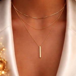 Collar de tres hebras: Diseño minimalista en oro - Largo ajustable
