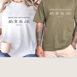 May include: Two t-shirts, one white and one olive green, each with a graphic design and text. The white shirt says "KEINE ZEIT, BIN IN RENTE" with icons and "JUNI 2026". The olive shirt says the same with "MAI 2026".