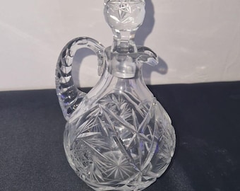 Vintage Kristallkaraffe aus geschliffenem Glas mit Sternmotiv-Griff, elegantem Verschluss, aus Frankreich
