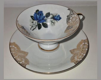 Bavaria Tasse und Untertasse, rosa-blaues Porzellan mit Vintage-Golddekor