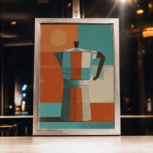 Peut inclure: Impression d'art encadrée représentant une cafetière stylisée. L'œuvre utilise une palette de couleurs rétro avec de l'orange, du bleu sarcelle et du beige. Un soleil blanc est dans le coin supérieur gauche. La cafetière est au centre.