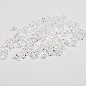 Kryształowe koraliki Swarovski Crystal April Birthstone partia 4 mm - 100 sztuk