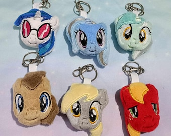 Llaveros con cabeza de peluche de poni