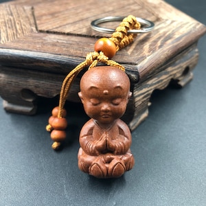 May include: A set of three ceramic mugs with a speckled, matte finish. The mugs are in shades of cream, light gray, and dark gray. Each mug has a simple, minimalist design, perfect for coffee or tea.