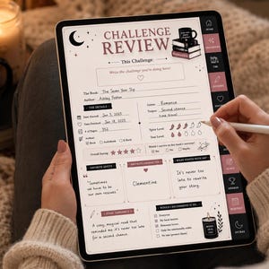 May include: A person uses a stylus to write on a digital tablet displaying a book review template. The template includes sections for book details, ratings, and quotes. A mug with the words "BOOKS HEAL" sits nearby.