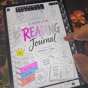 May include: A digital reading journal on a tablet, with the title "Reading Journal" in pink and black. The journal includes prompts, book stacks, and the text "A Customizable Scrapbook & Journal for Book Lovers."