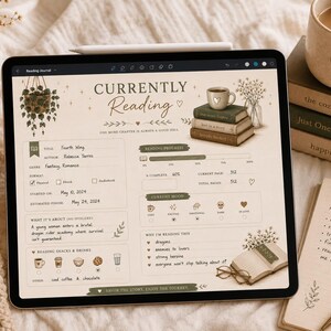 May include: A digital reading journal on a tablet, featuring a "Currently Reading" layout with book details, progress trackers, and reading goals. A mug with a heart, books, a candle, and a notebook with a pen are also visible.