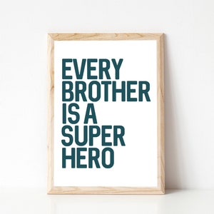 May include: A framed print with the text "Every brother is a super hero" in dark blue letters on a white background.